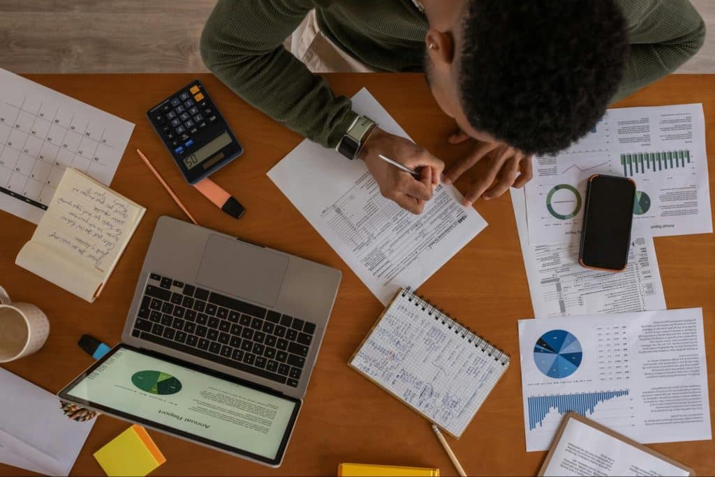A man computing finances