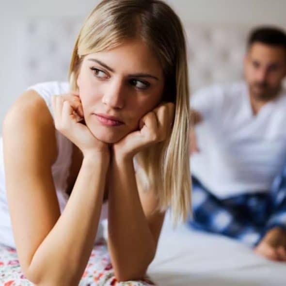 The husband notices his wife looking distant at home