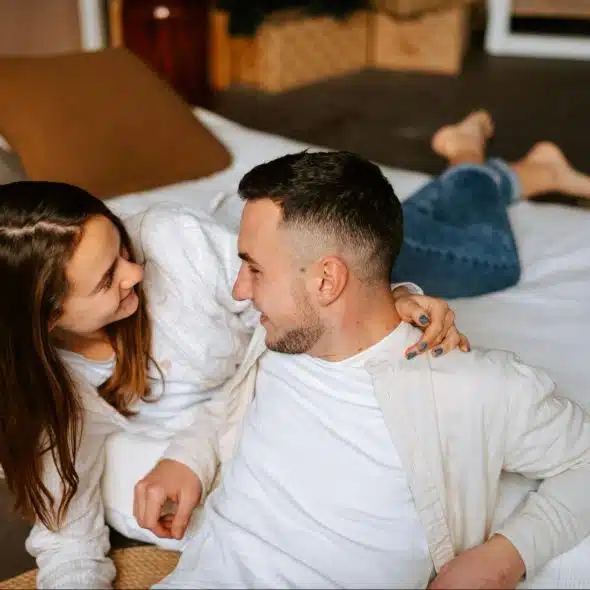 A man and woman looking at each other