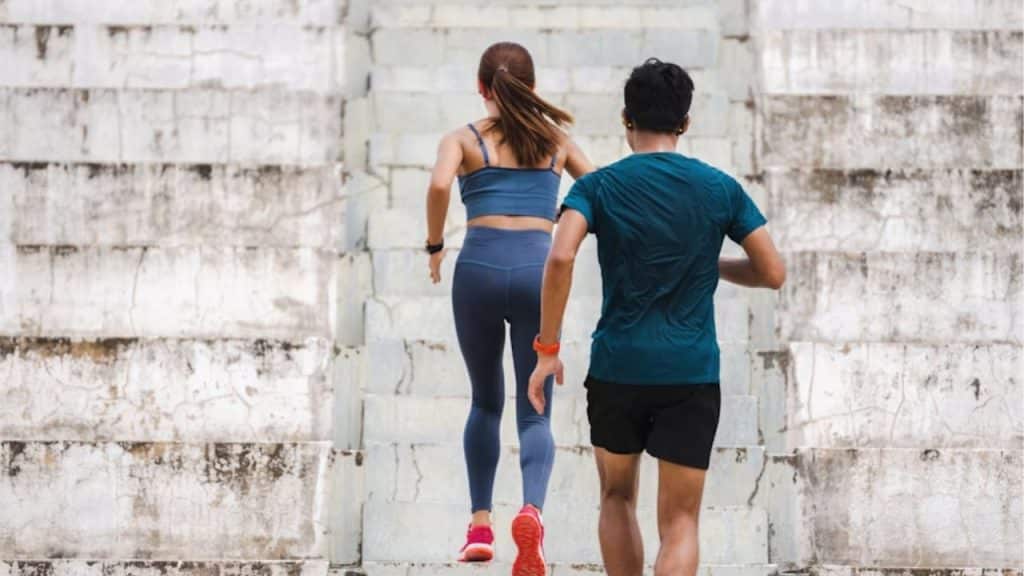 Wife jogging ahead ignoring husband who is left behind