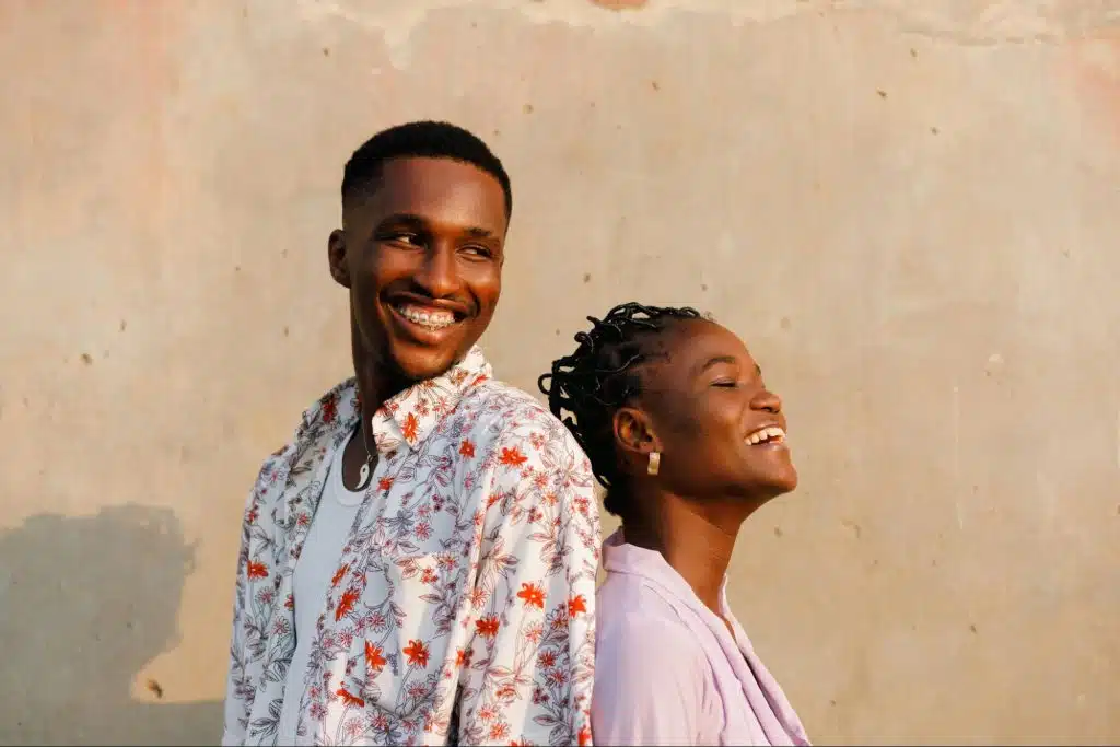 A man and woman laughing together