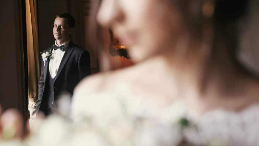 Husband dressed up, wife ignoring him