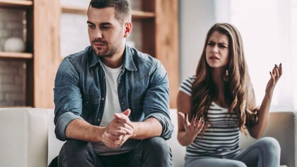 Couple arguing in the living room