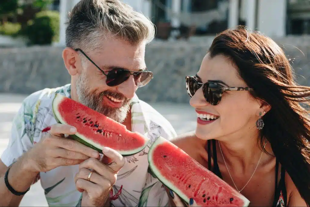 A man and woman eating healthy