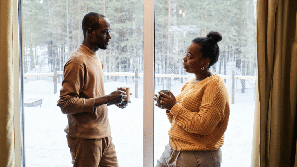 A couple having a serious talk at home