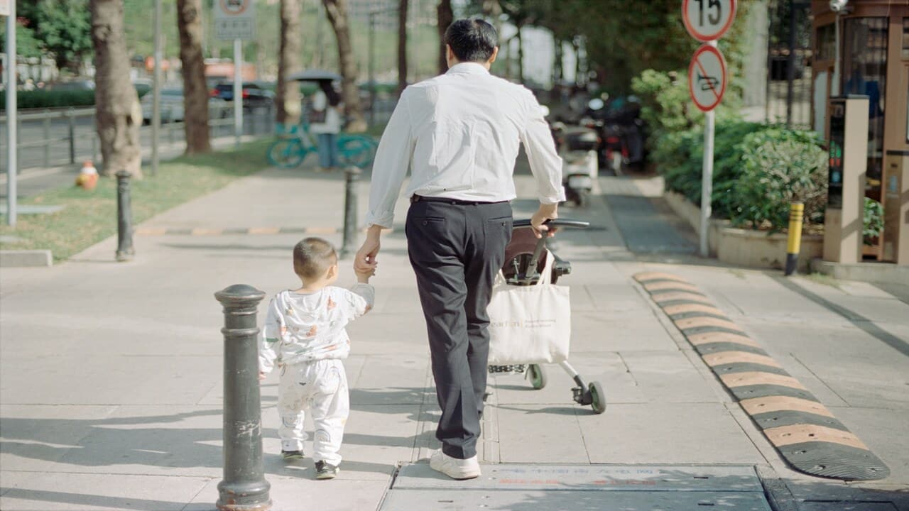 A dad walking with his child.