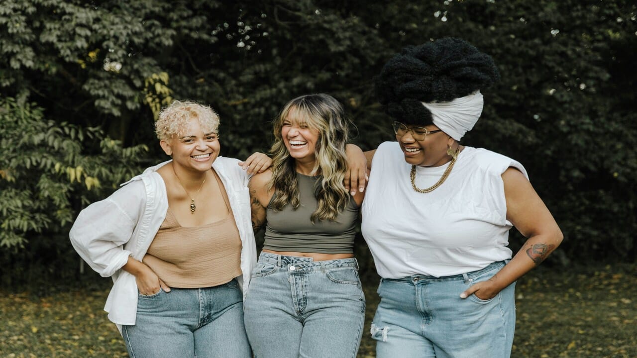 Female friends laughing together.
