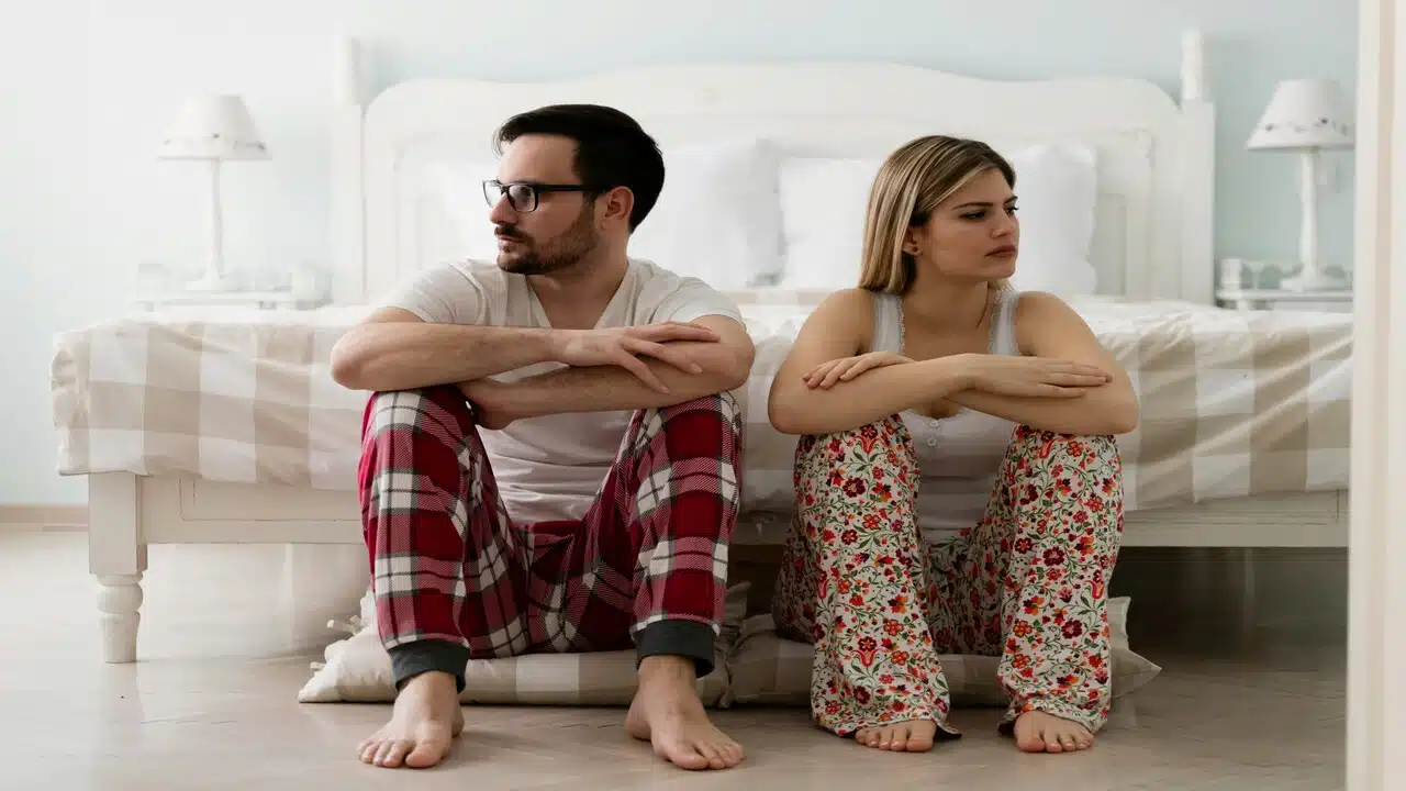 A couple refusing to look at each other.