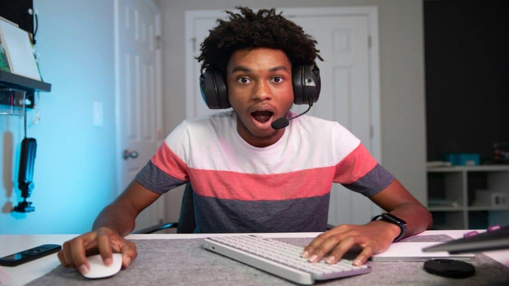 A young man playing computer games