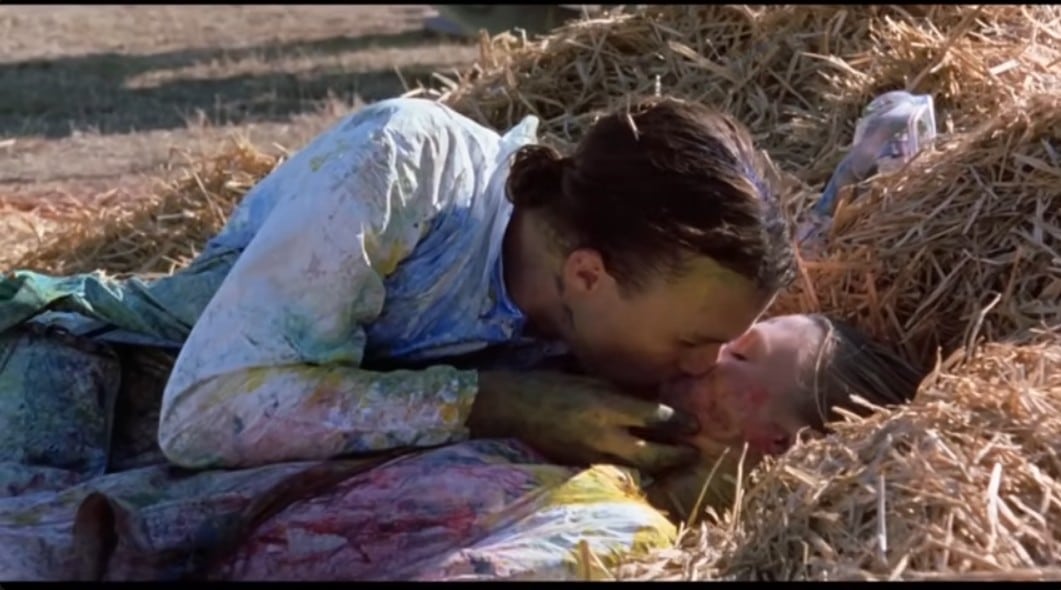 A picture of man and woman kissing in the movie.