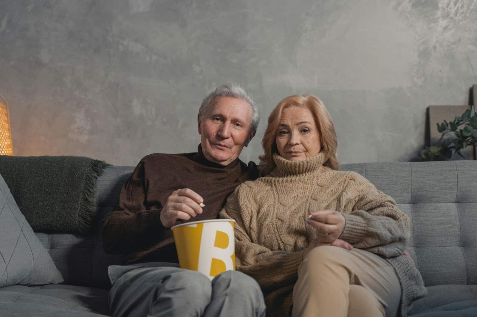 A man and woman will watch a movie together.