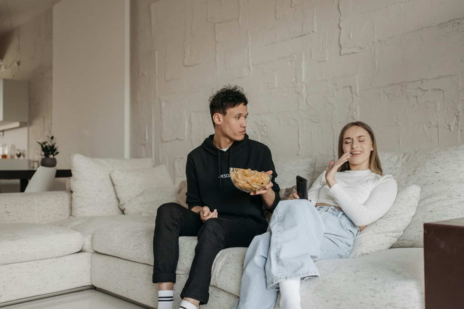 A man and woman talking about the series.