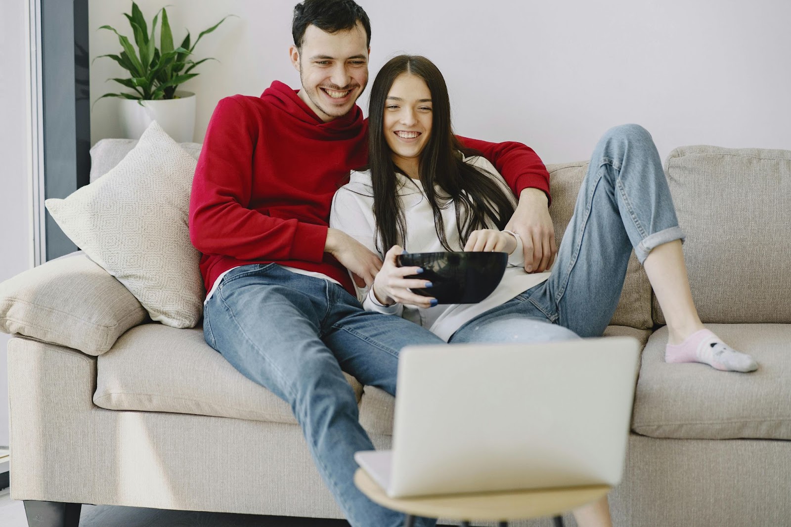 A picture of a woman and man having fun together.