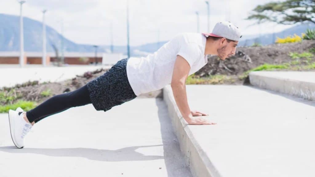 Man doing a morning exercise, symbolizing everyday discipline