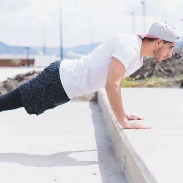 Man doing a morning exercise, symbolizing everyday discipline