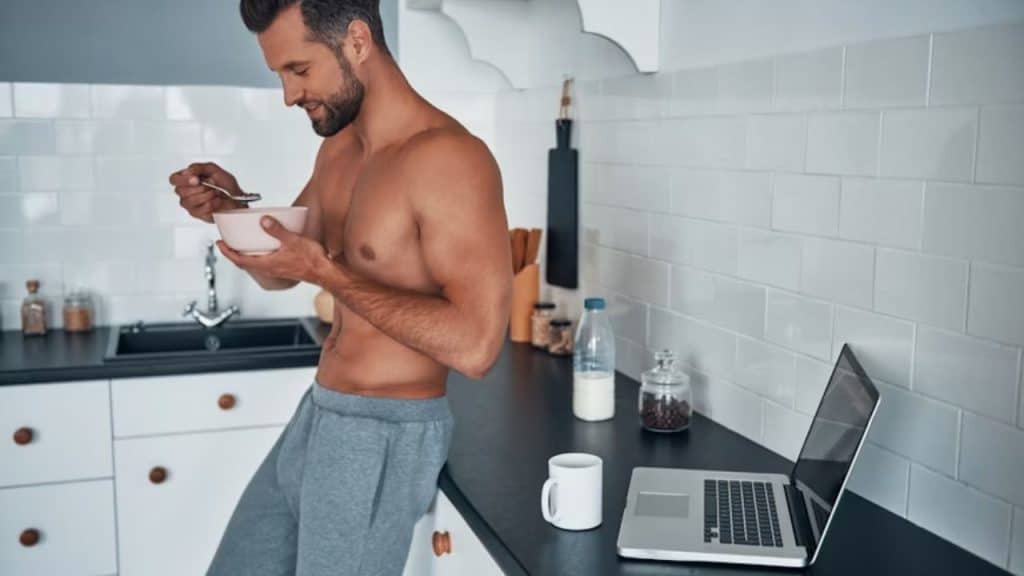 Man eating a healthy post workout meal