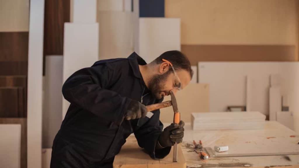 Man learning a new skill in a workshop setting