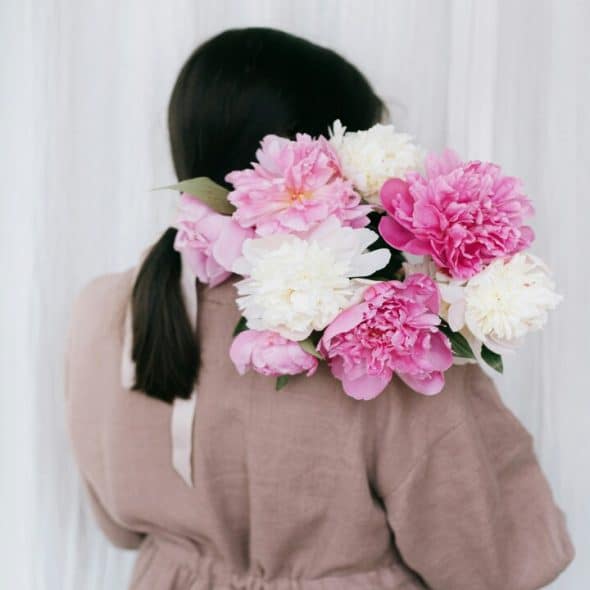 A woman holding a bouquet