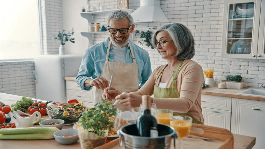 A mature couple cooking together