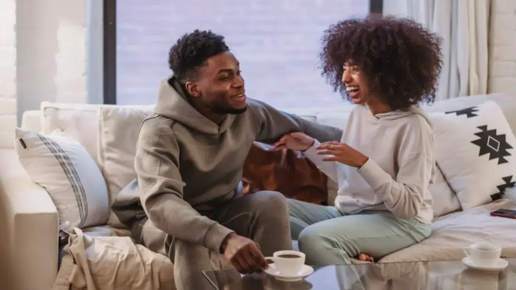 A couple talking while laughing.