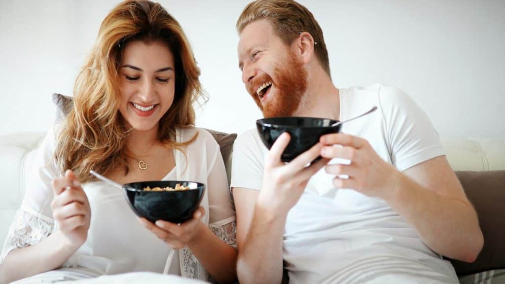 A couple joking together 