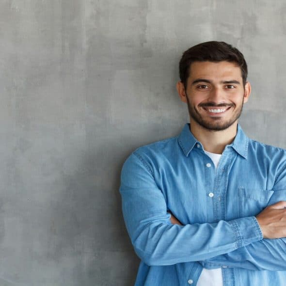 A man smiling at the camera