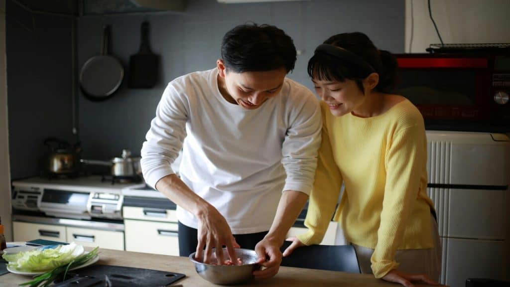 A couple cooking together