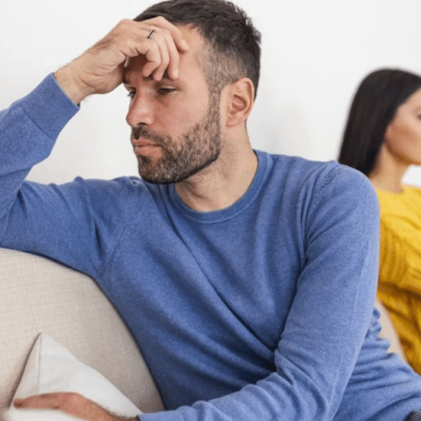 Man feeling distant from partner while sensing something is wrong