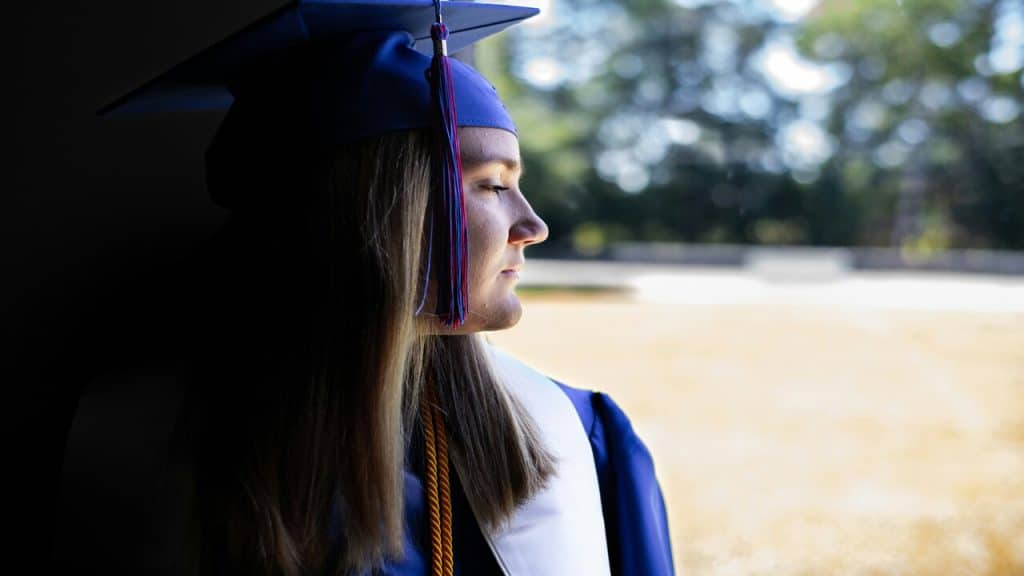 A woman sad during her graduation