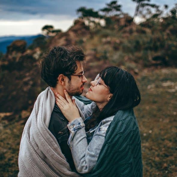 A man and woman on the mountains.