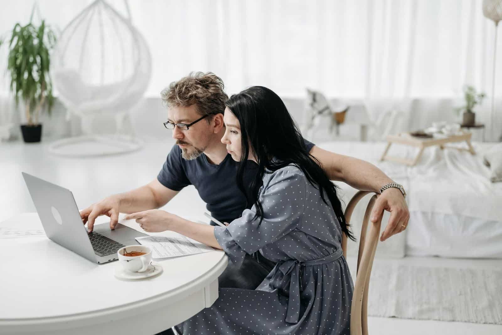 A man and woman working together.