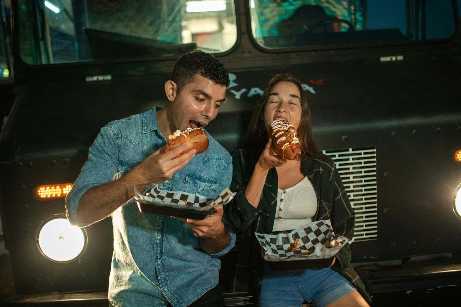 A man and woman eating.