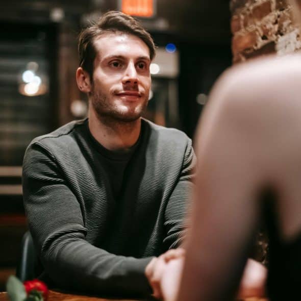 A man looking at his date.