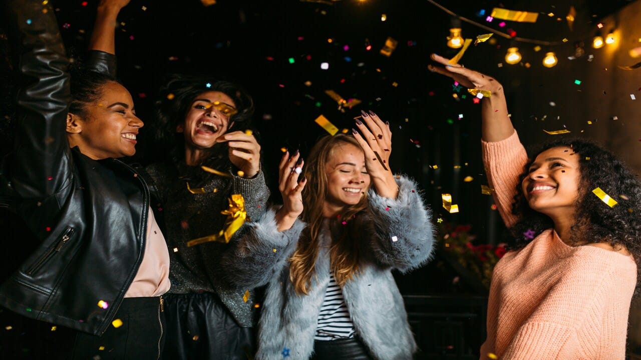 Female friends partying together.