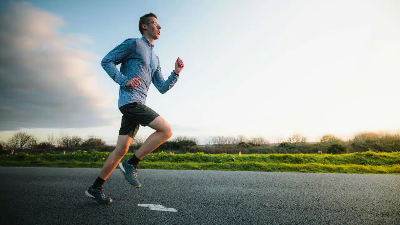 A man jogging by himself.