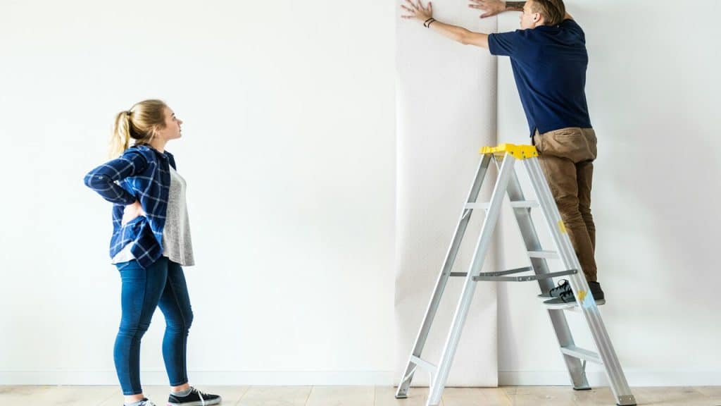A couple choosing wallpaper