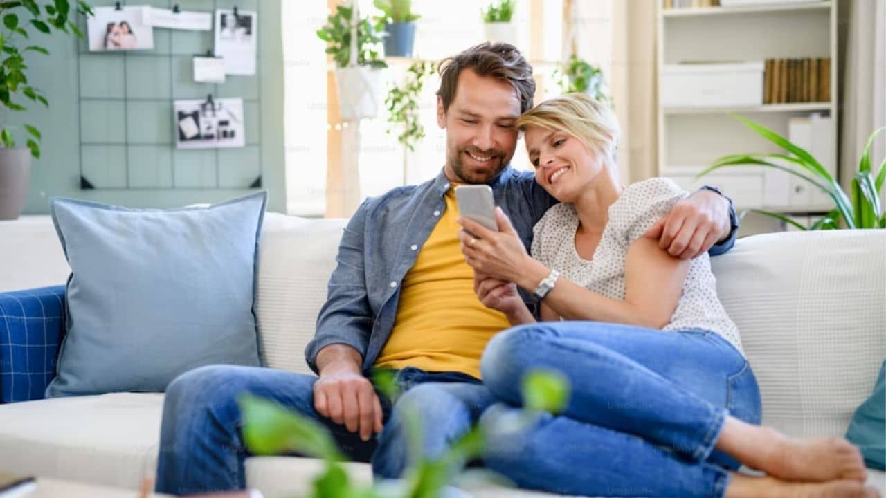 A husband listening attentively while his wife talks.