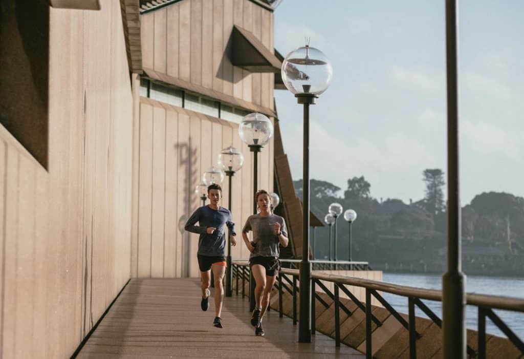 A man and woman taking a jog