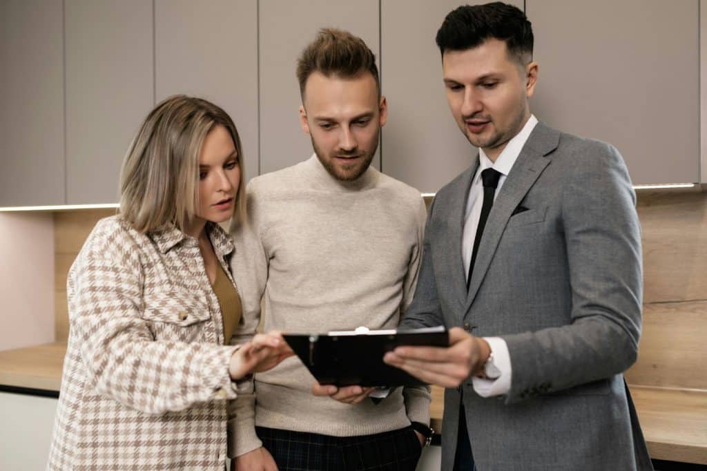 A man and woman checking their plan