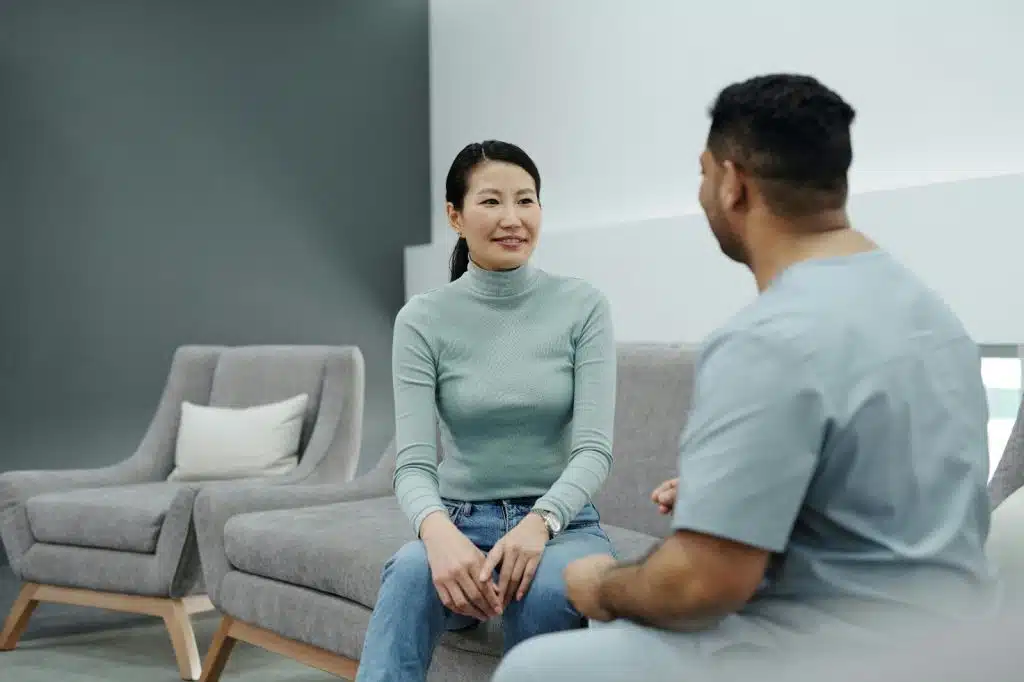 A man and woman talking
