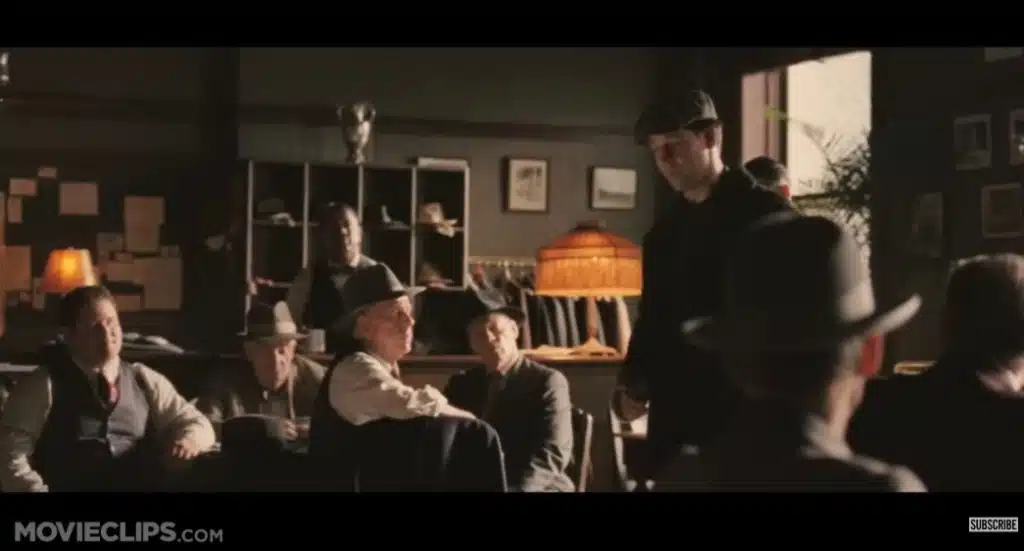 A man talking to men