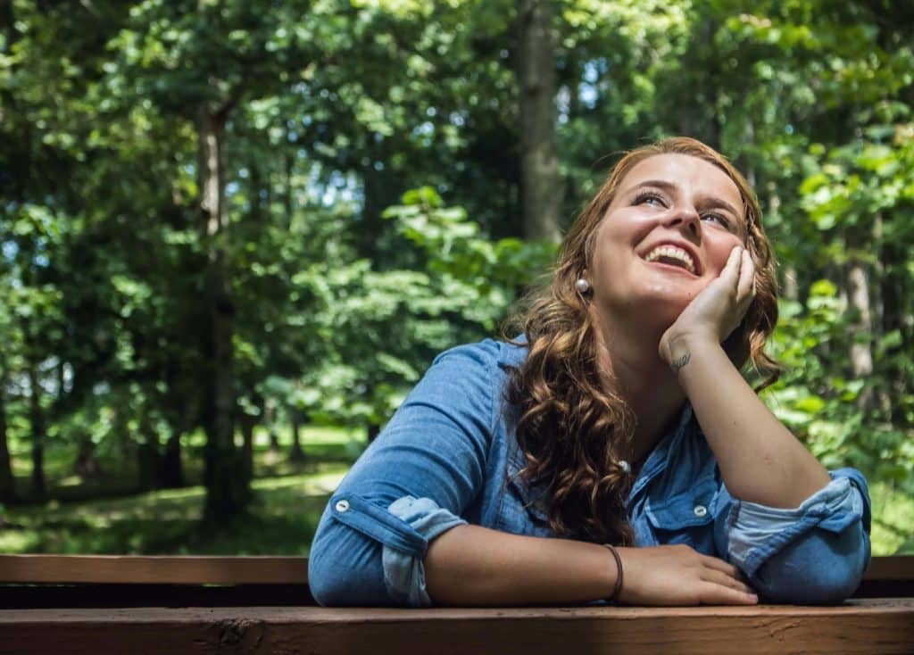 A woman daydreaming