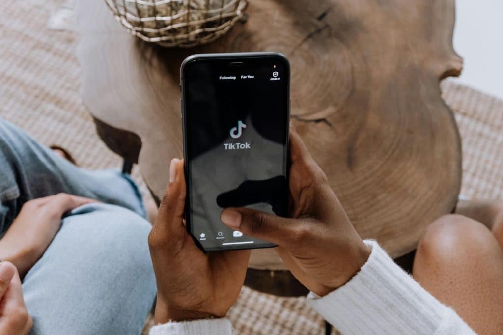 A picture of a man holding a phone