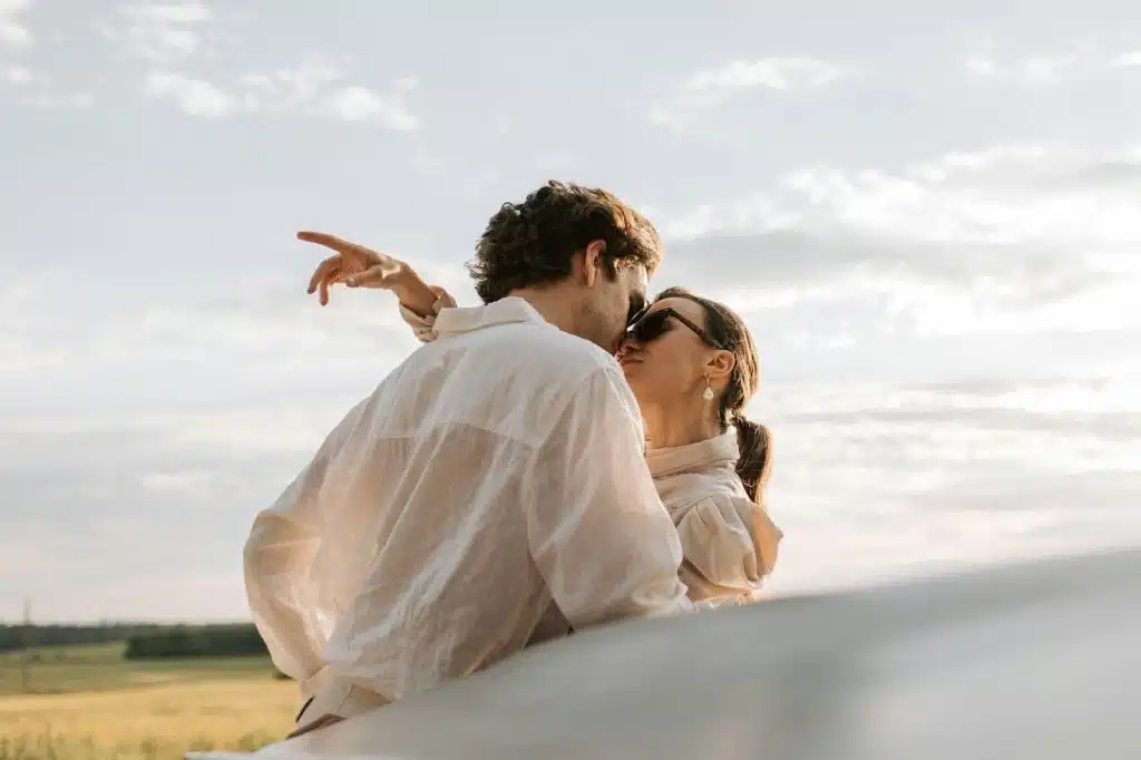 A man and woman hugging each other