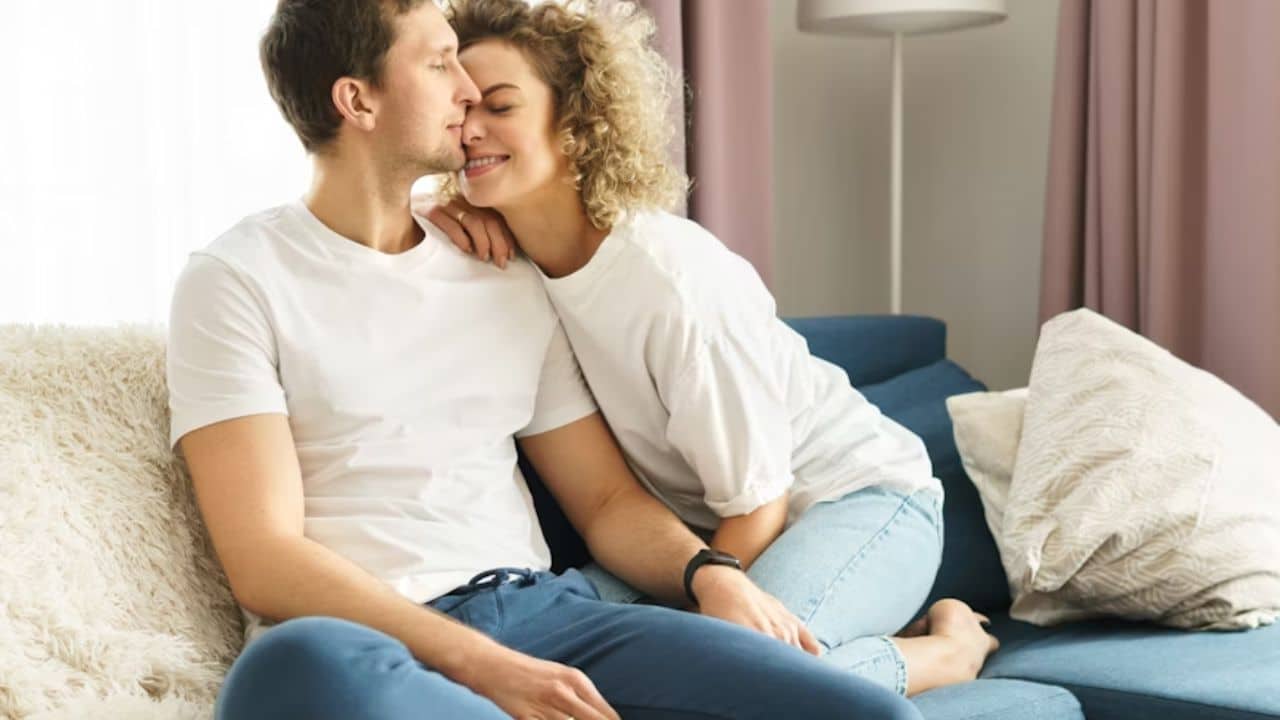 Husband  setting his phone aside to focus on wife.