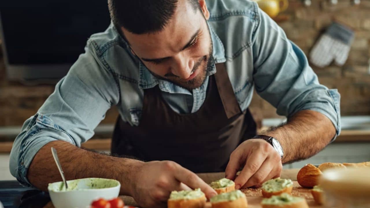 A man preparing a healthy meal in the kitchen.