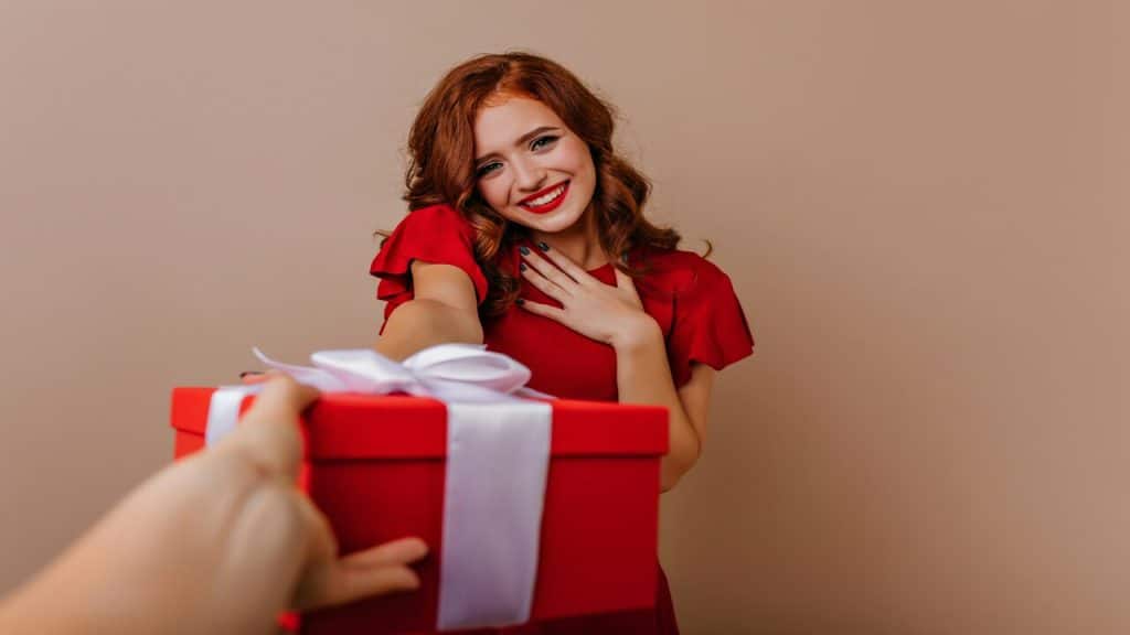 A woman receiving a  gift