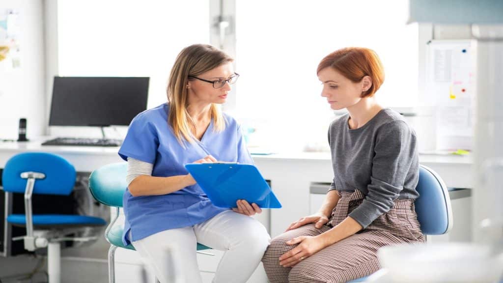 A woman with her doctor