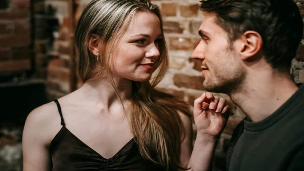 A couple looking at each other during their date