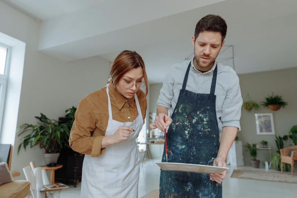 A man and woman doing their hobby together